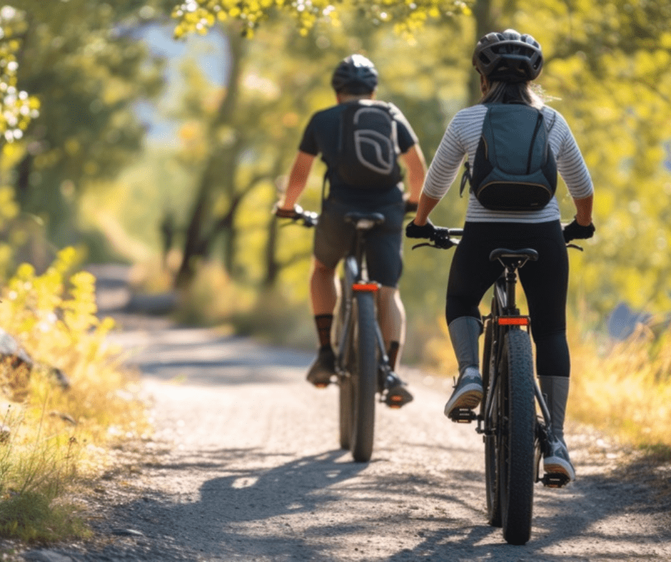 Visitors ride e-bikes along trail.